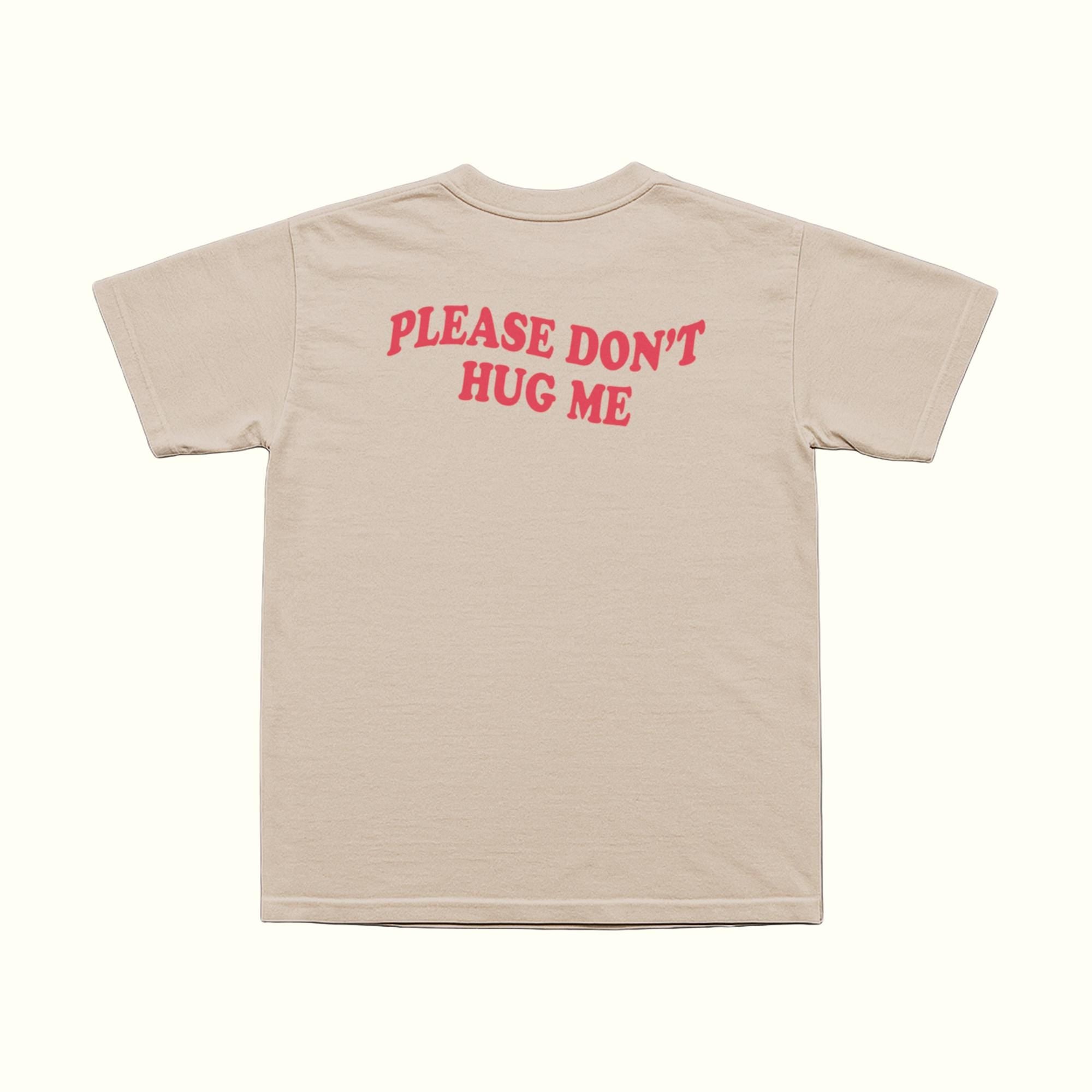 Beige T-shirt back with red 'PLEASE DON'T HUG ME' text