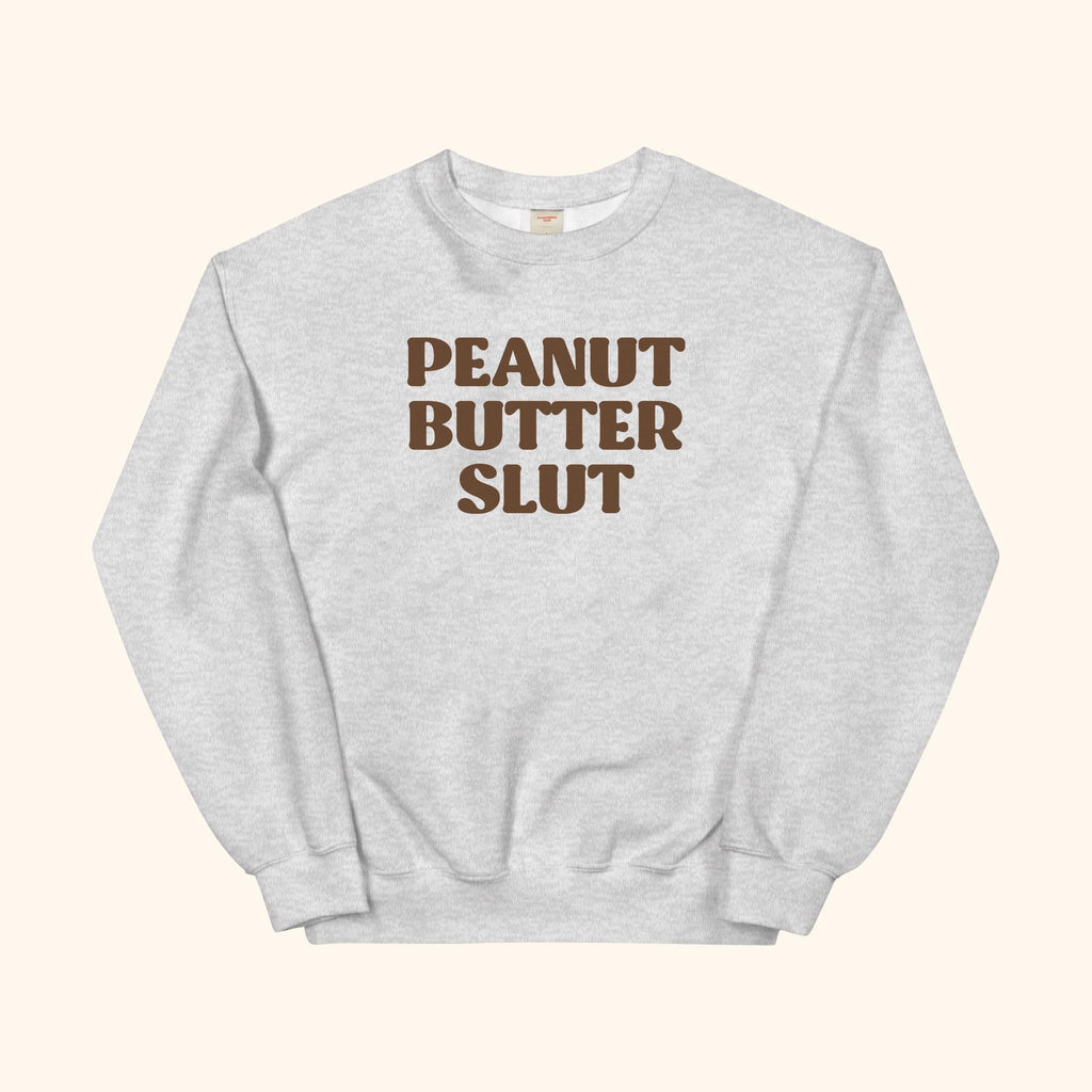 Peanut Butter Slut sweatshirt, gray crewneck with large front graphic text