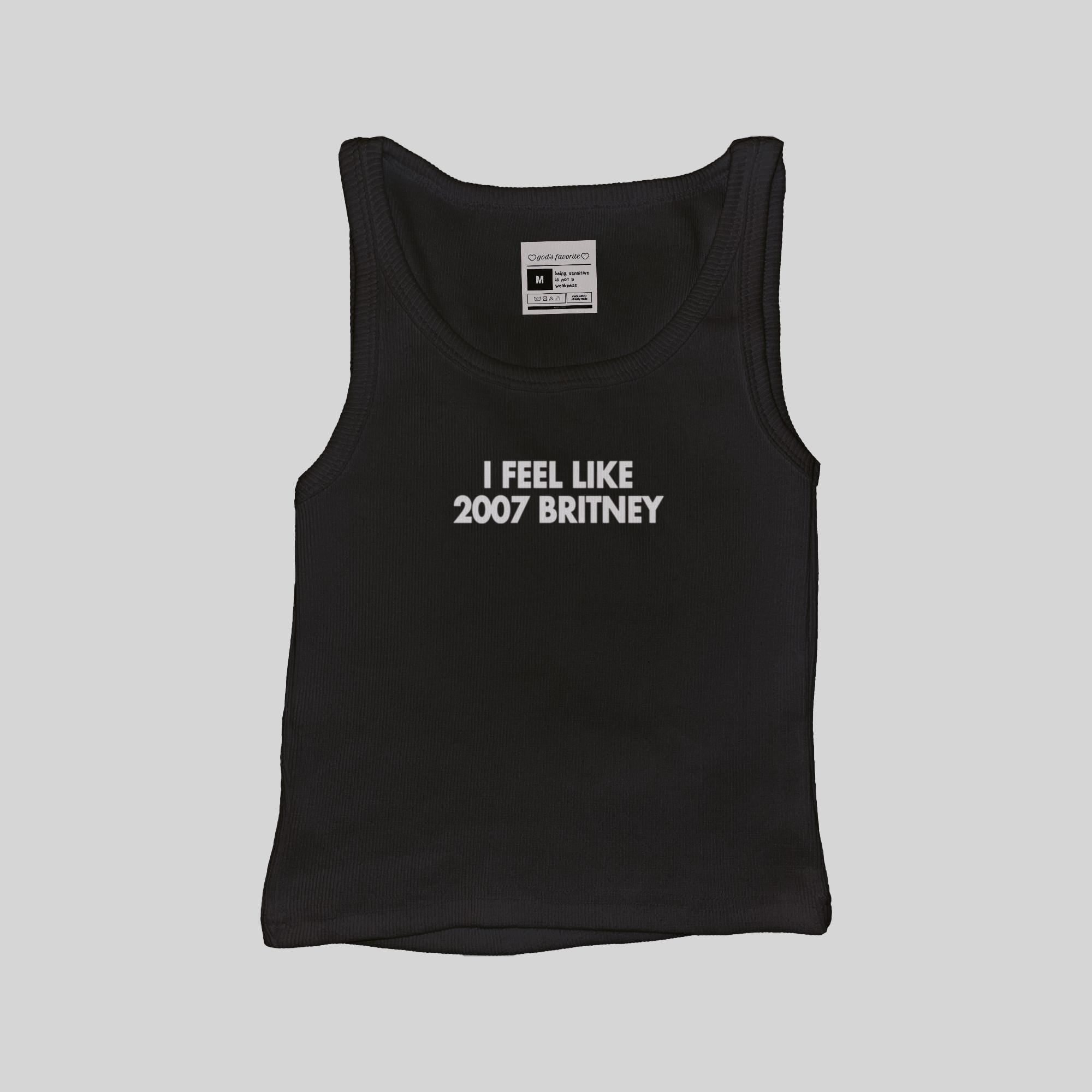 Black ribbed muscle tank top with “I FEEL LIKE 2007 BRITNEY” front print, size tag