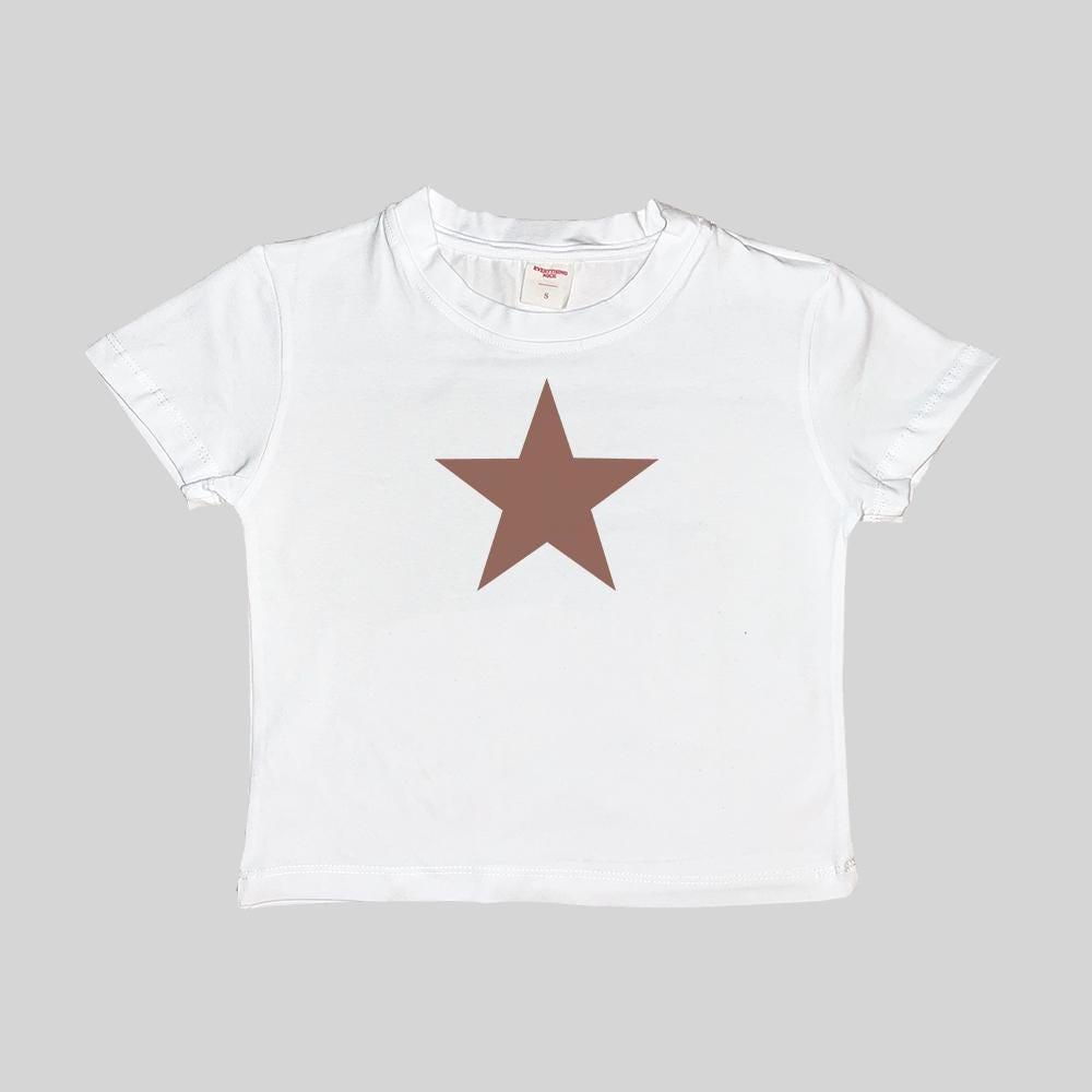 White baby T-shirt with brown star print, short sleeves, crew neck.