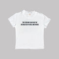 White baby T-shirt with “Dogs and books” slogan on the front