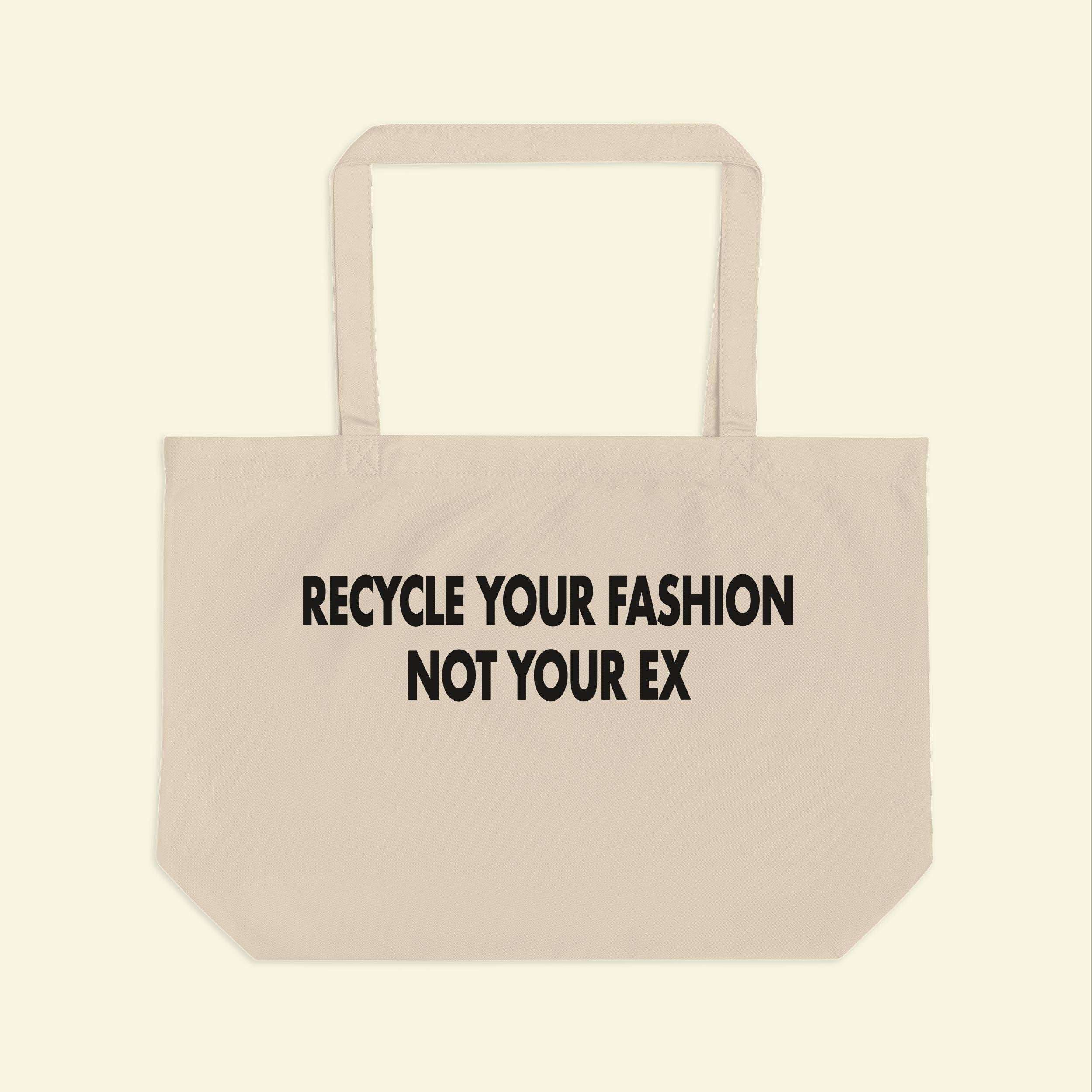 Beige canvas tote bag with handles, front text 'RECYCLE YOUR FASHION NOT YOUR EX'