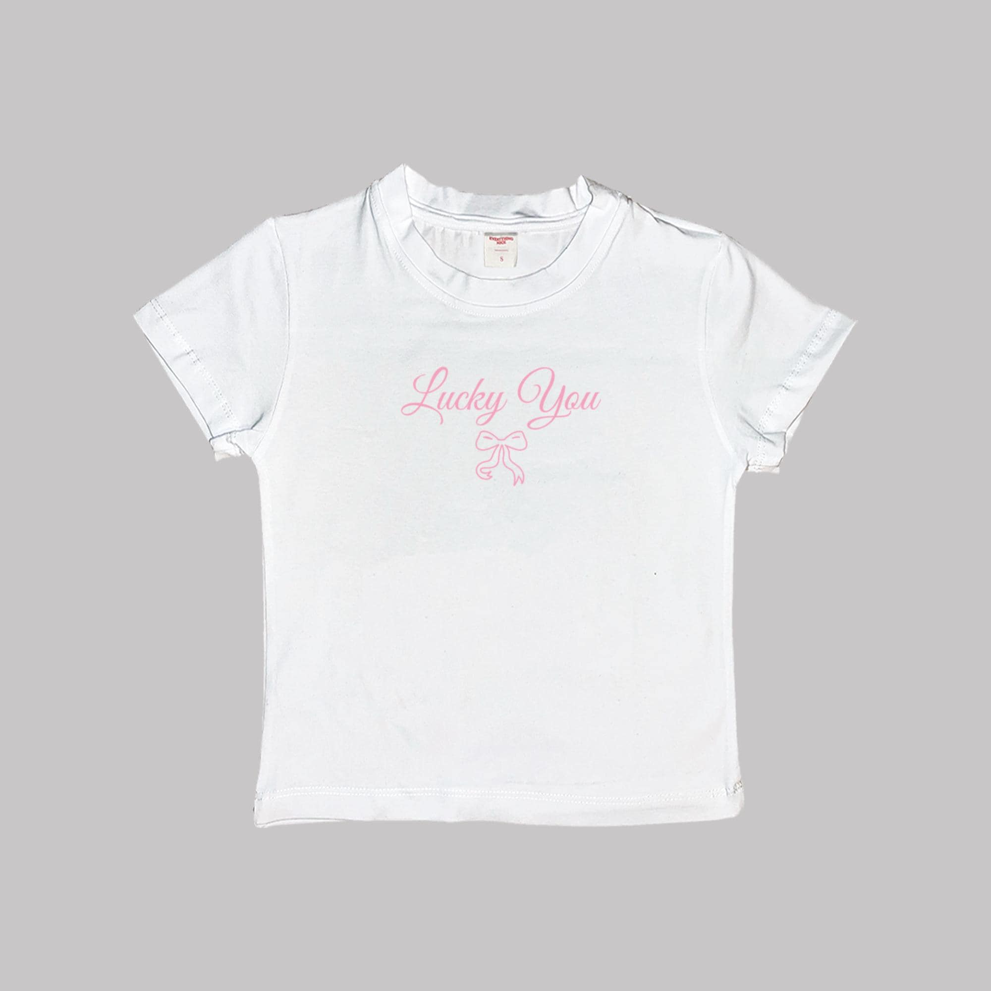 Lucky You Baby Tee Crop Top Shirt in Weiß, rosa „Lucky You“ mit Schleifen-Print