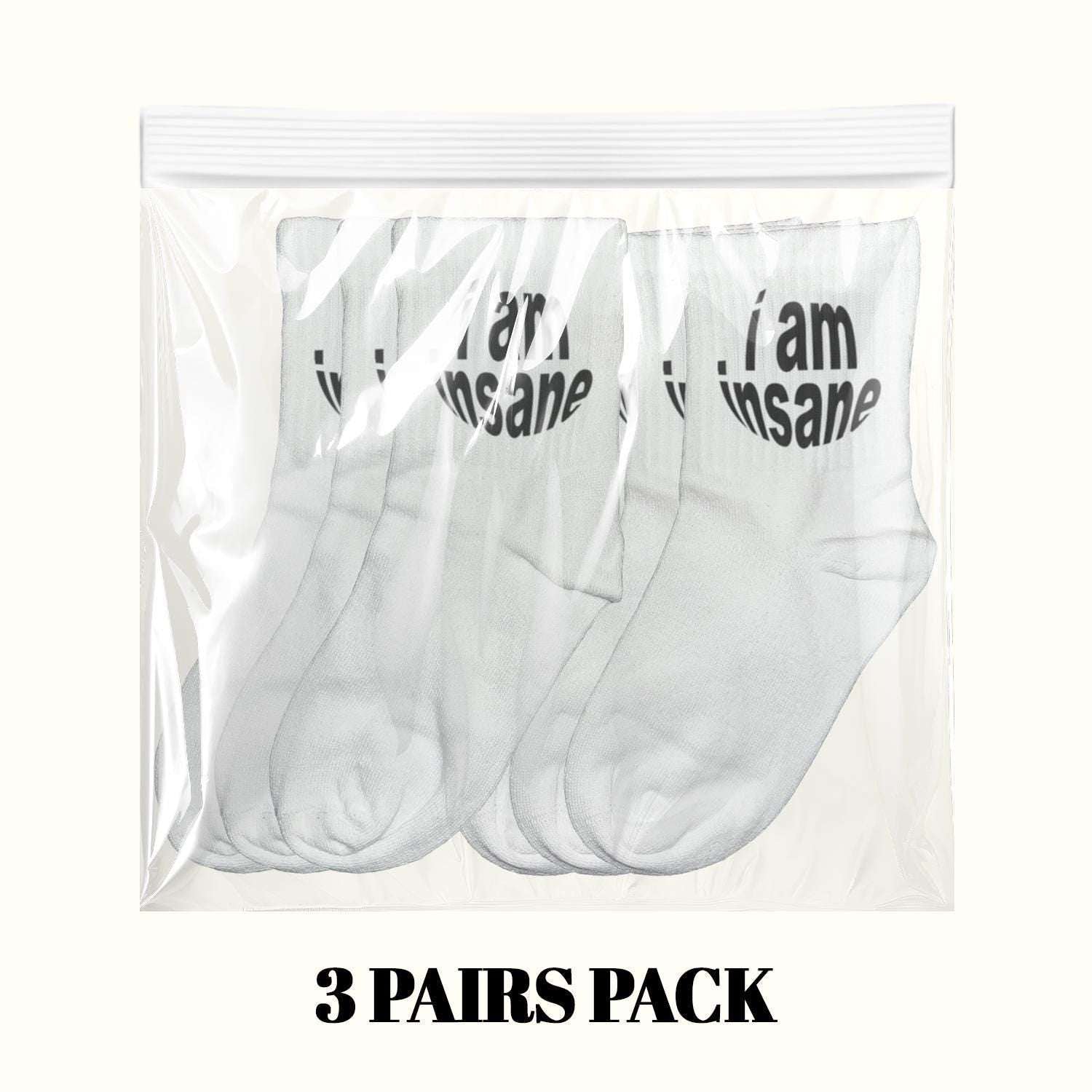 White crew socks in pack with black “I am insane” text