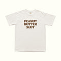 T-shirt bianca con scritta “PEANUT BUTTER SLUT” in marrone
