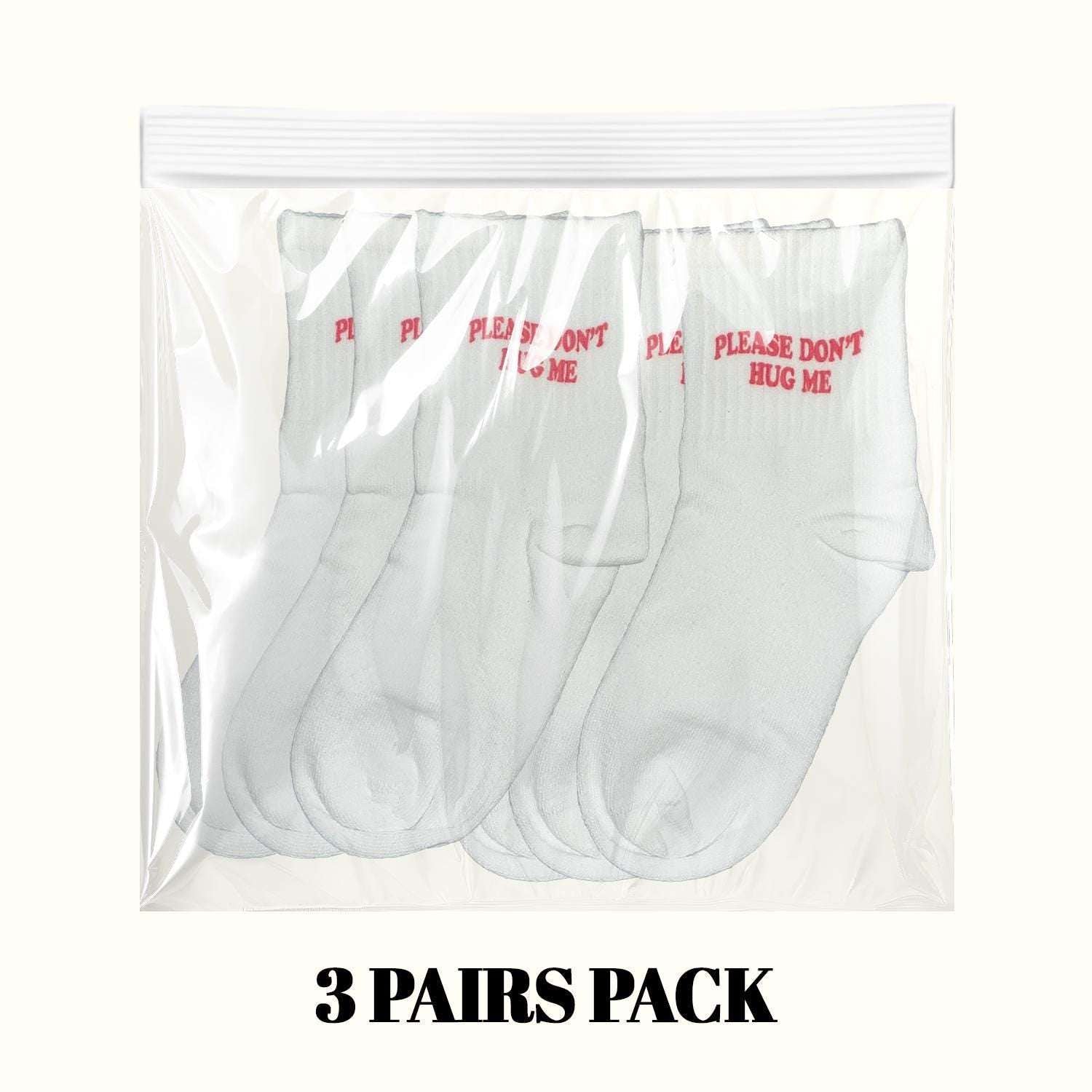 3-pack crew socks in light gray with red “PLEASE DON’T HUG ME” print