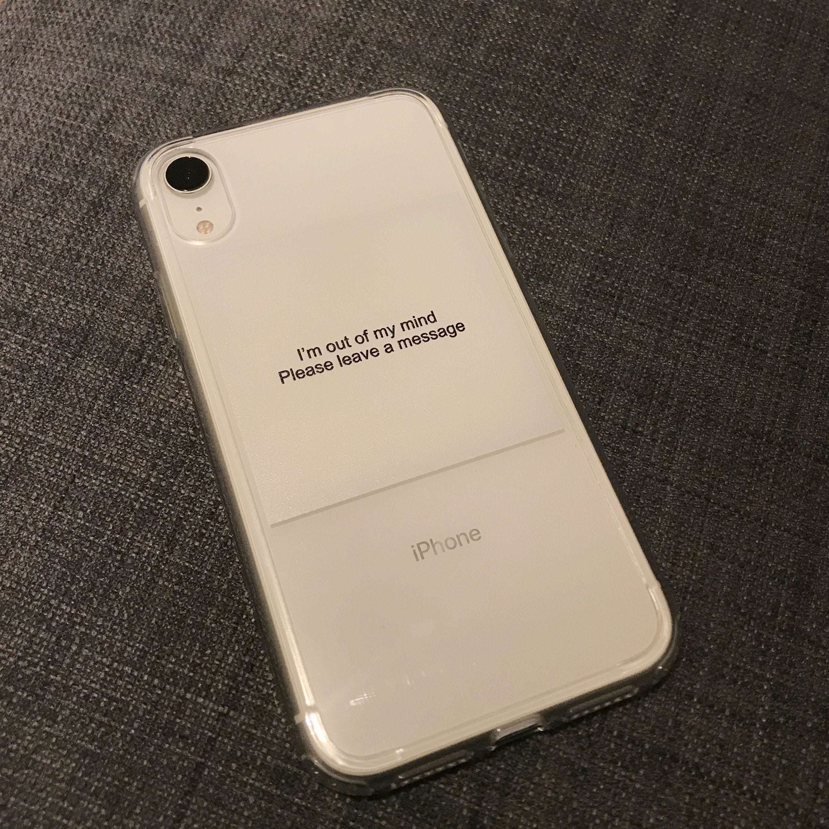iPhone clear phone case with message: Please leave a message, camera cutout