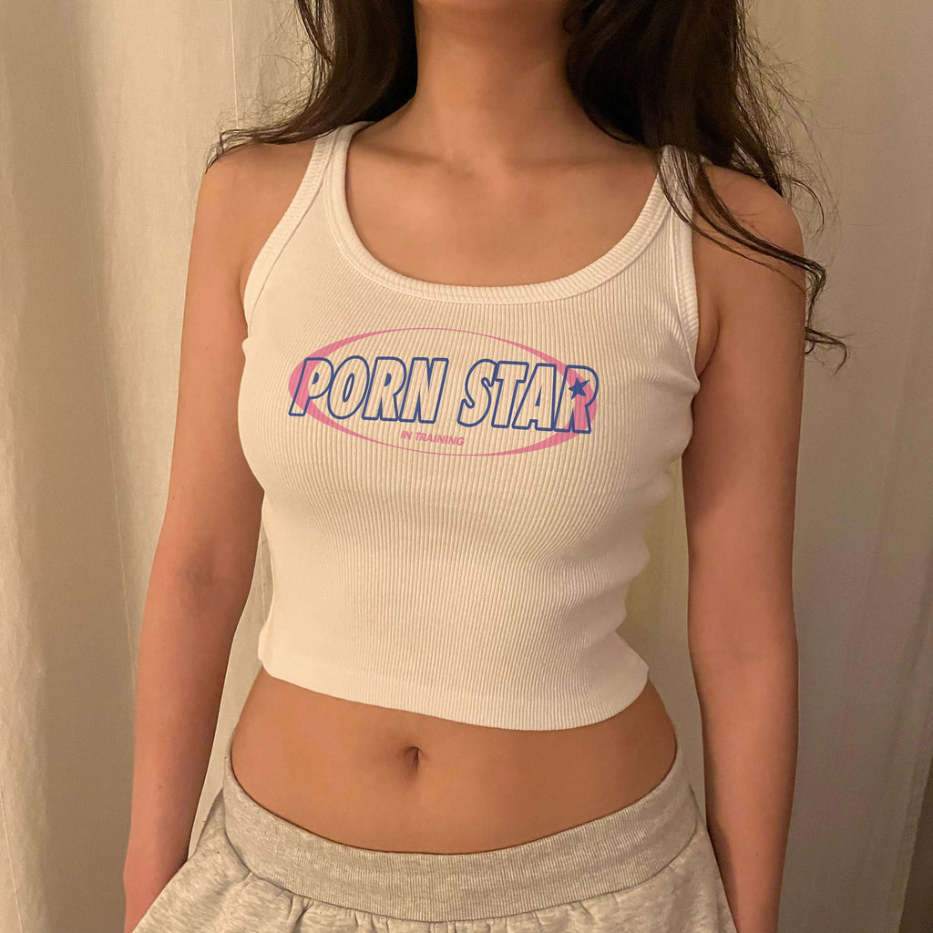 White ribbed muscle tank top with colorful front graphic, crew neckline