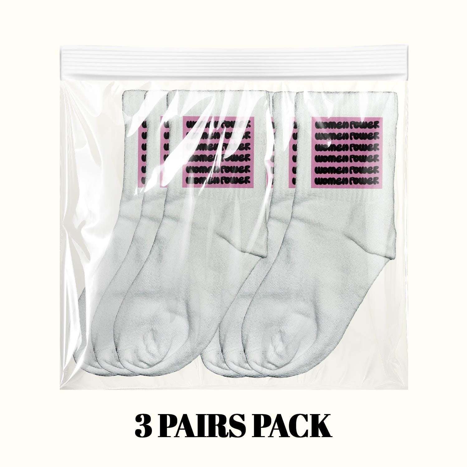 3-pack of white crew socks with purple empowerment text, in poly bag