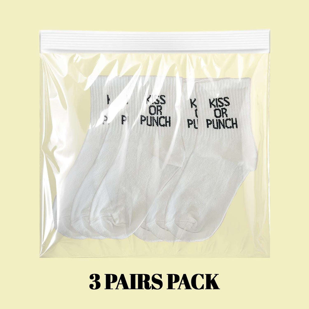 3 pairs pack of white crew socks with 'KISS OR PUNCH' text in bag