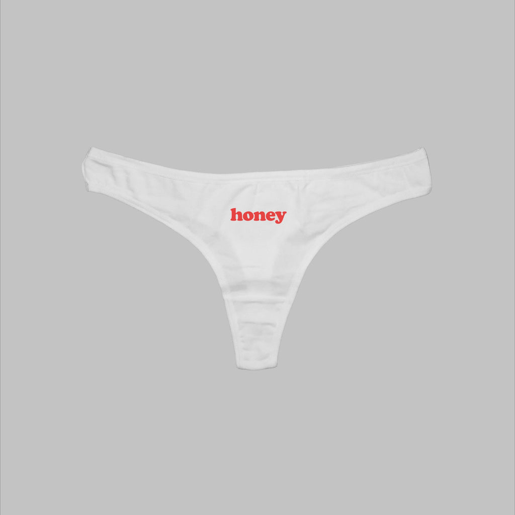 Honey thong panties, white, low-rise cut with wide waistband and center graphic
