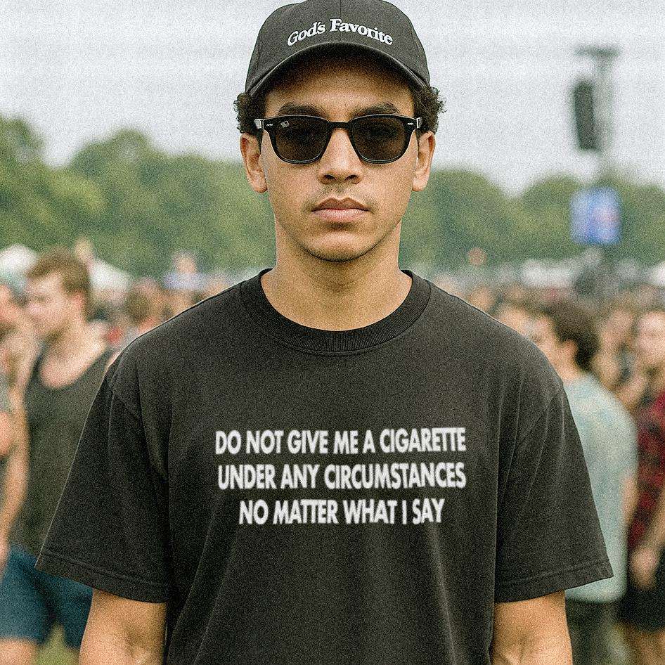 Black graphic T-shirt with white slogan text across the chest