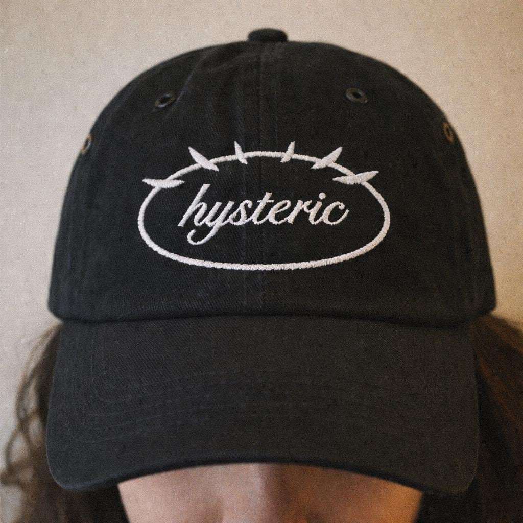 Black Hysteric hat with white oval logo on the front