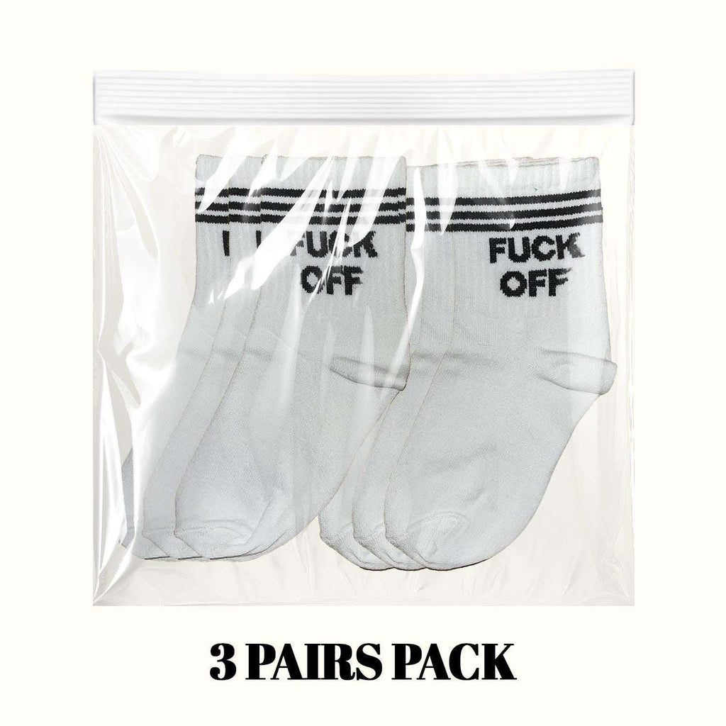 White crew socks in clear pack, black stripe cuffs with 'FUCK OFF' print