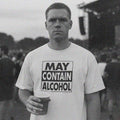 White unisex T-shirt with bold “MAY CONTAIN ALCOHOL” front graphic