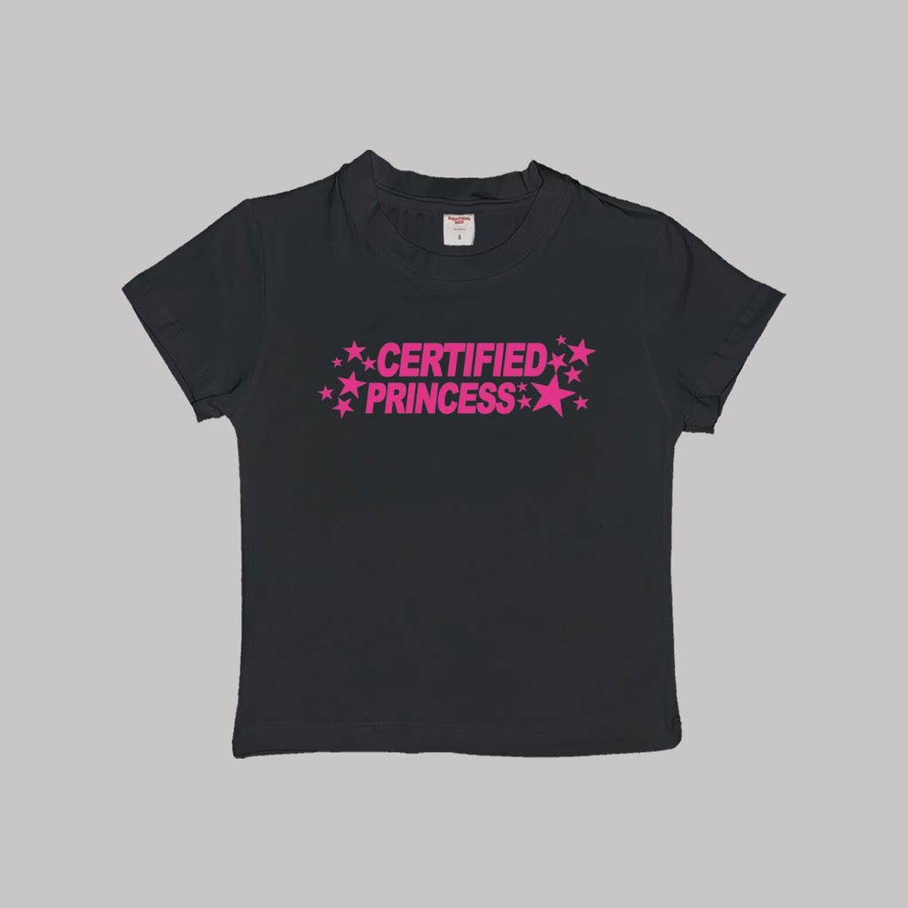 Black short-sleeve crop baby tee with pink 'CERTIFIED PRINCESS' star lettering.