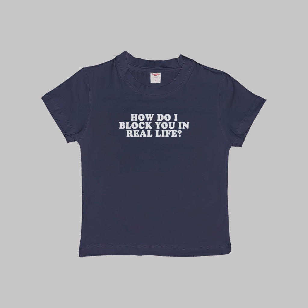 Navy crop baby tee with 'HOW DO I BLOCK YOU IN REAL LIFE?' white graphic.