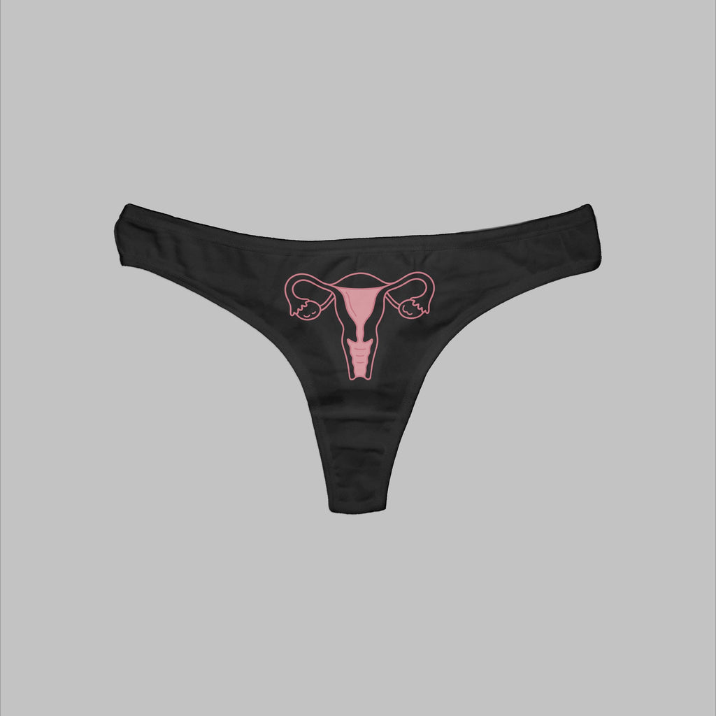Black thong panty with pink uterus and vagina graphic on the front