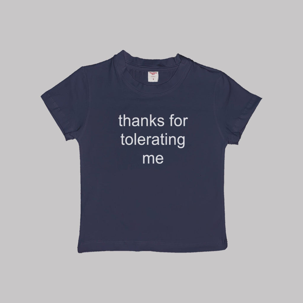 Navy cropped baby tee with 'thanks for tolerating me' white text