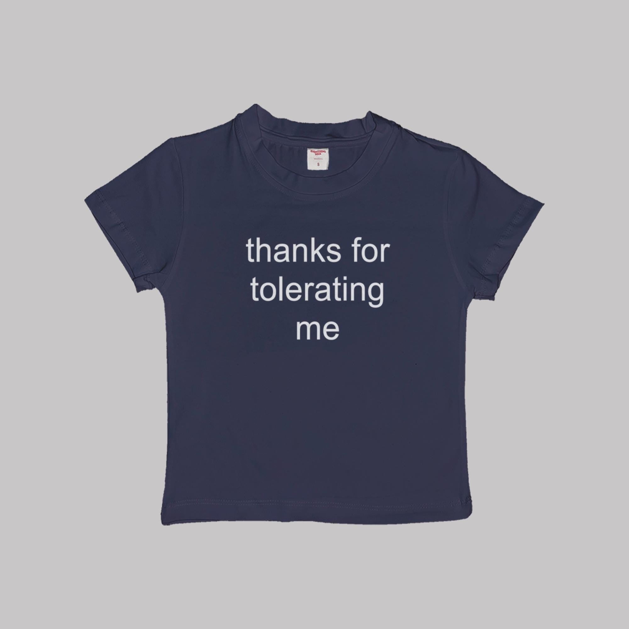 Navy cropped baby tee with 'thanks for tolerating me' white text