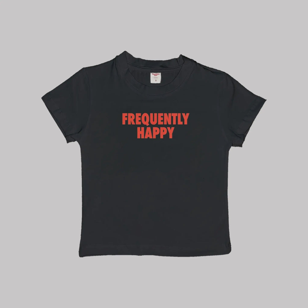 Black crop baby tee with crew neck and red “FREQUENTLY HAPPY” graphic
