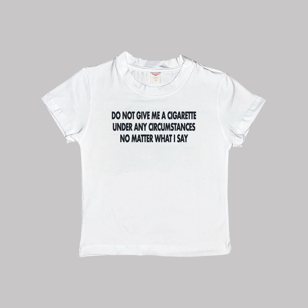 White short-sleeve baby tee with black slogan print