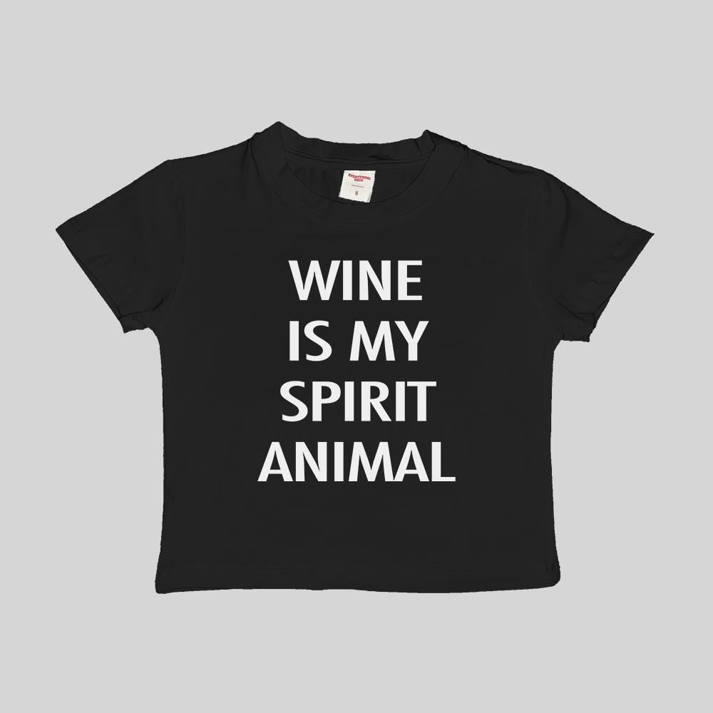 Black cropped baby T-shirt with “WINE IS MY SPIRIT ANIMAL” in white lettering.