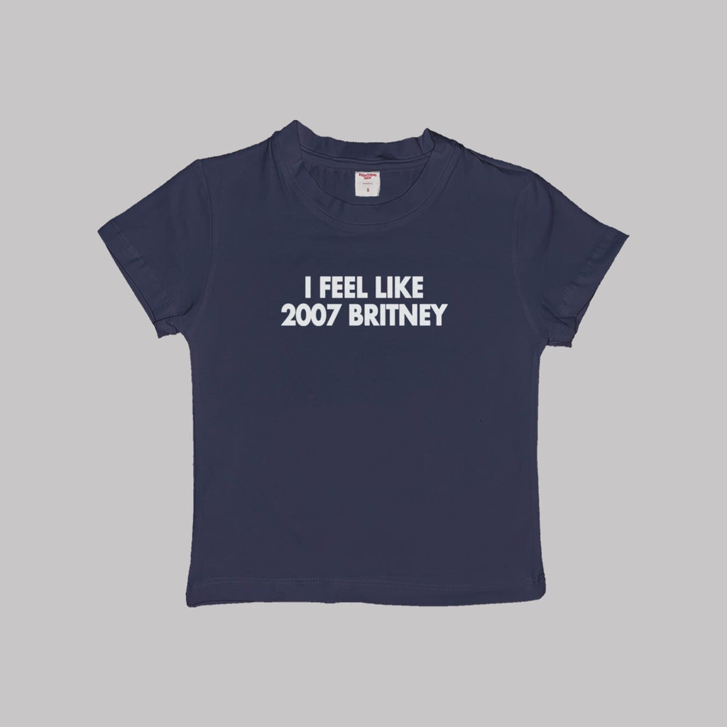 Navy crop baby tee with “I FEEL LIKE 2007 BRITNEY” graphic on the front.