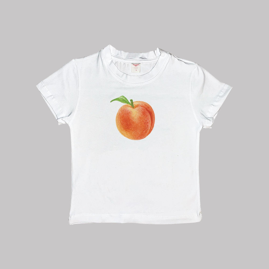 Camiseta crop bebé blanca con estampado watercolor de melocotón