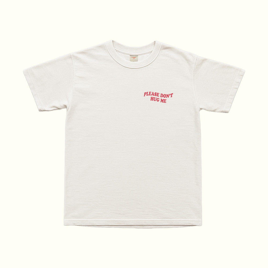 White T-shirt front with small red 'PLEASE DON'T HUG ME' logo