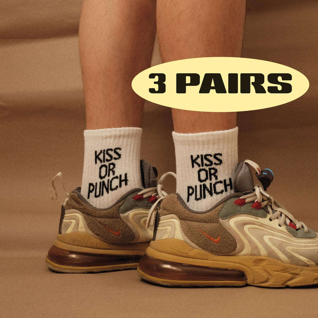 Kiss Or Punch crew socks, white with 'KISS OR PUNCH' text