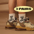 Kiss Or Punch crew socks, white with 'KISS OR PUNCH' text