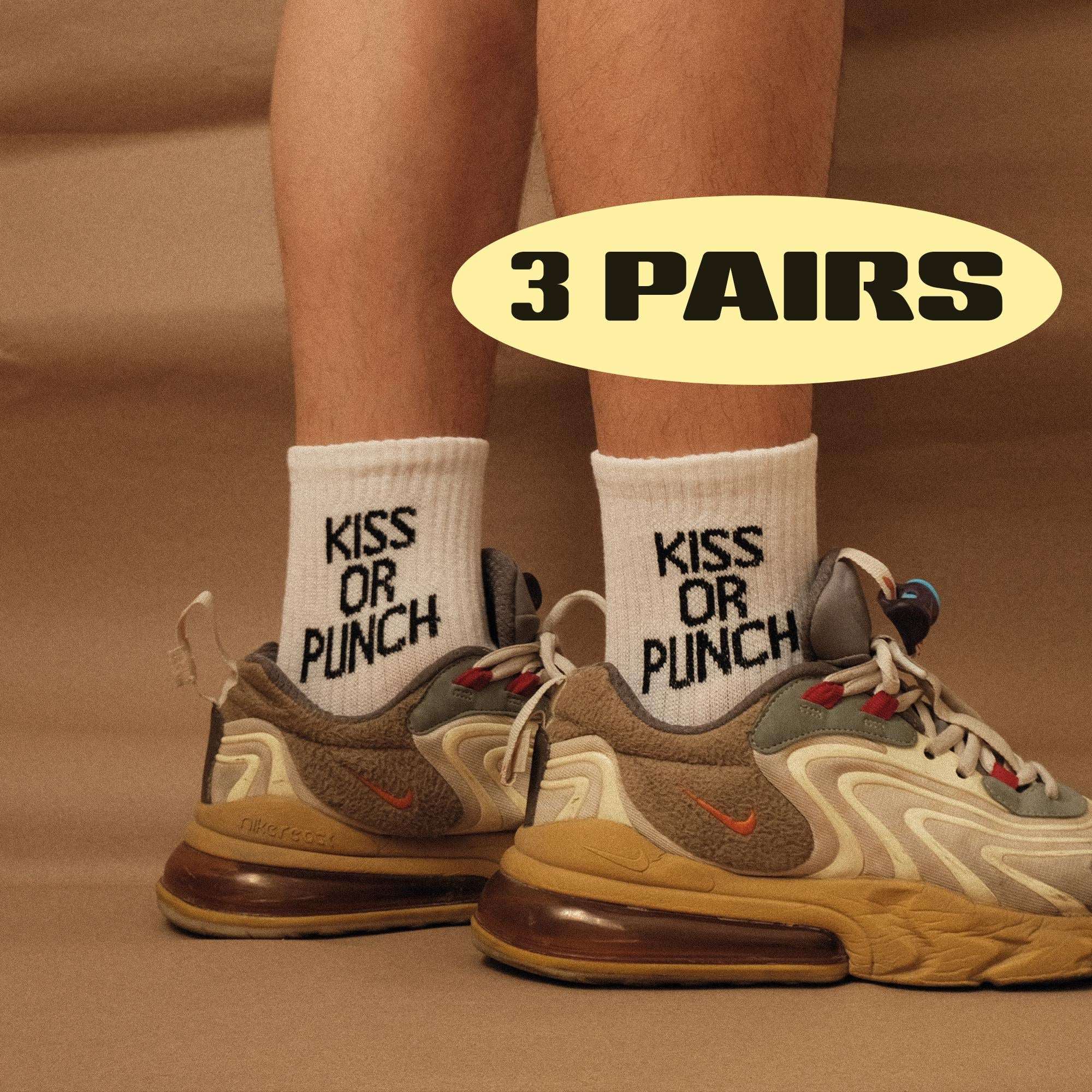 Kiss Or Punch crew socks, white with 'KISS OR PUNCH' text