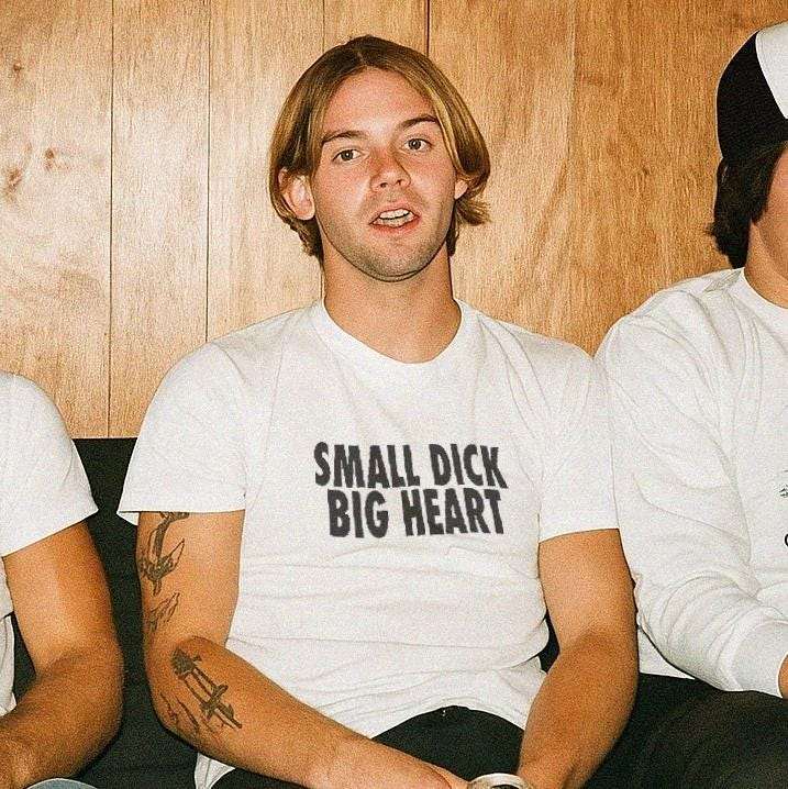 White unisex T-shirt with bold black text graphic: SMALL DICK BIG HEART