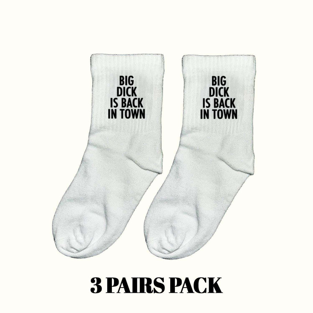 White crew socks with black slogan "BIG DICK IS BACK IN TOWN"
