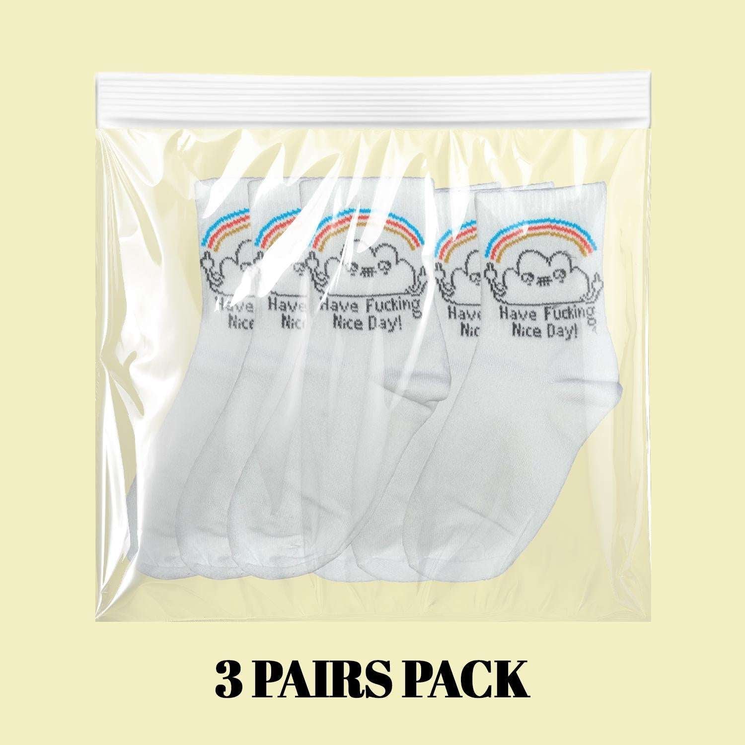 3 pairs pack of white crew socks with rainbow-striped cuff and smiling face prints