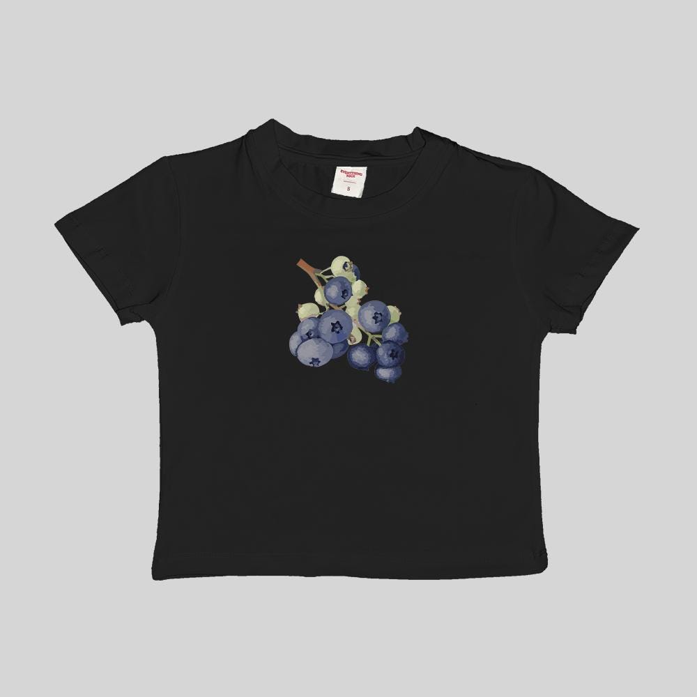 Black baby crop tee with blue grape bunch graphic on the chest