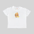 White crop baby tee with lemon cupcake graphic on front