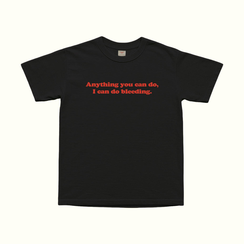 Black T-shirt with red “Anything you can do, I can do bleeding.” front graphic text
