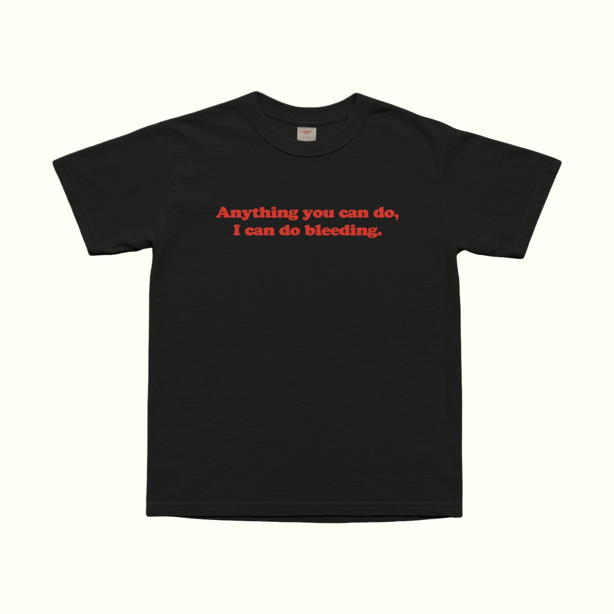 Black T-shirt with red “Anything you can do, I can do bleeding.” front graphic text