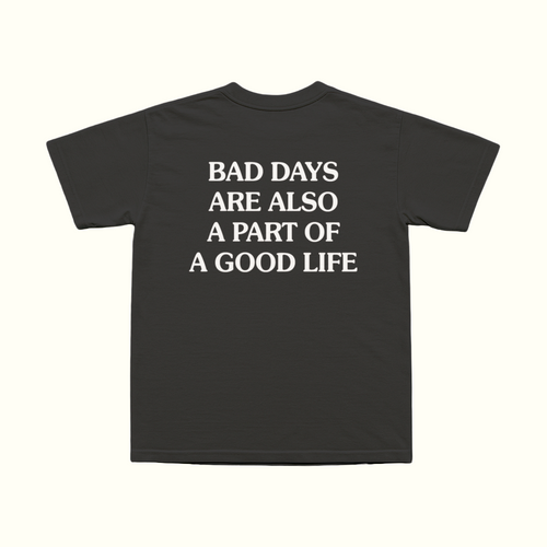 Black T-shirt with white front text: 'BAD DAYS ARE ALSO A PART OF A GOOD LIFE'.