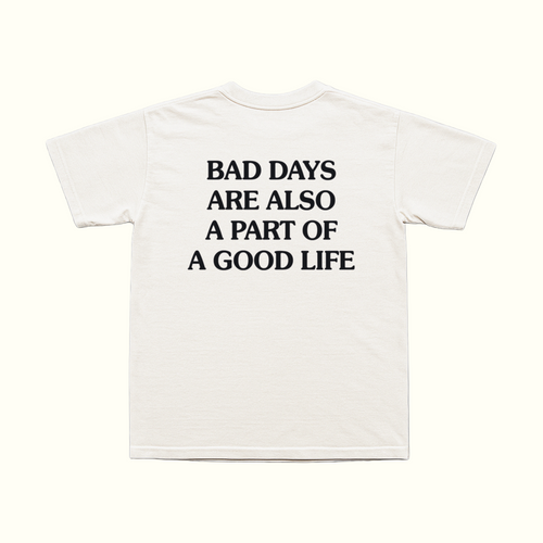 White T-shirt with black front text: 'BAD DAYS ARE ALSO A PART OF A GOOD LIFE'.
