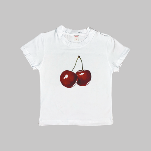 White baby tee with red cherry graphic