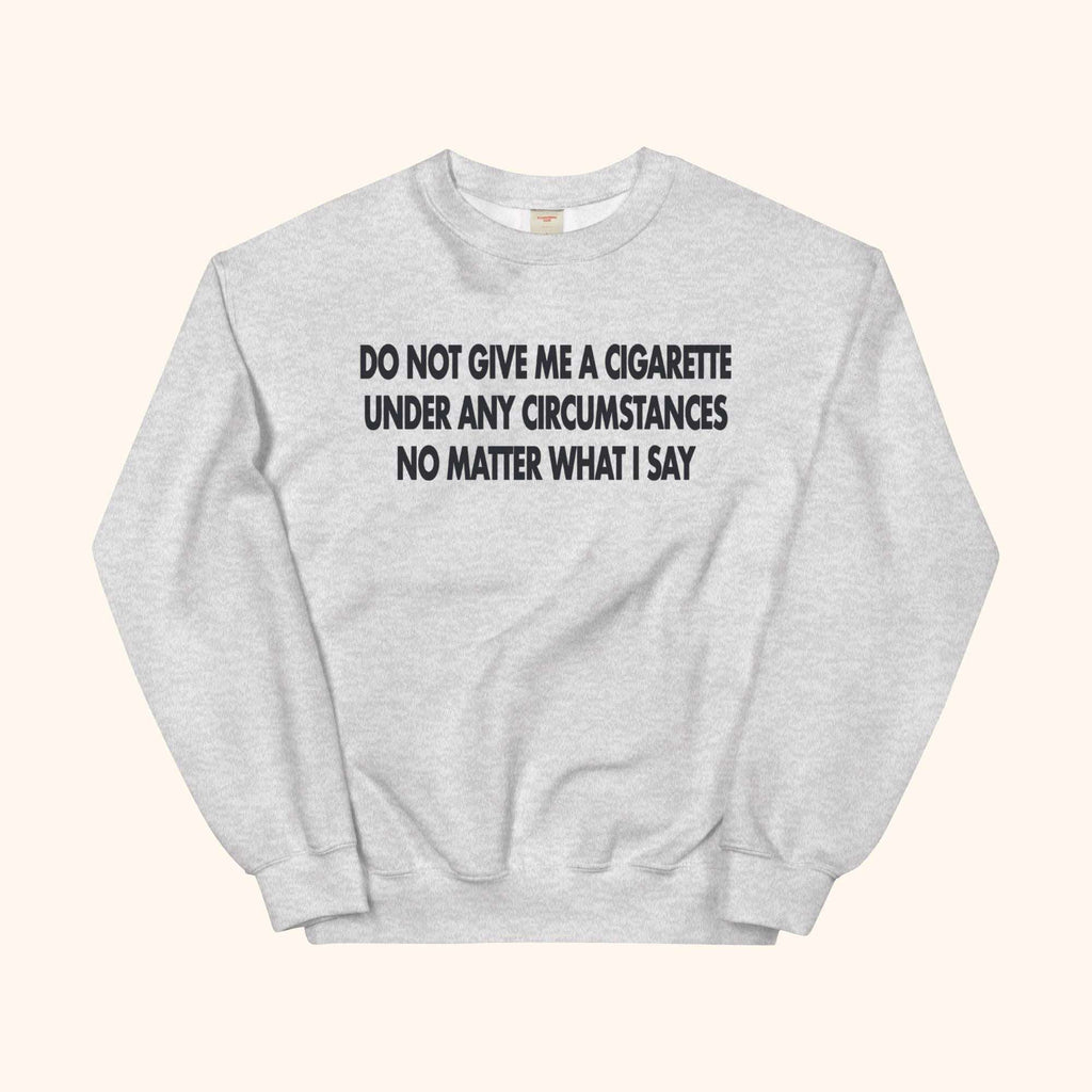 Heather gray sweatshirt with bold front message: DO NOT GIVE ME A CIGARETTE