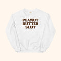 Peanut Butter Slut sweatshirt, white crewneck with large front text logo
