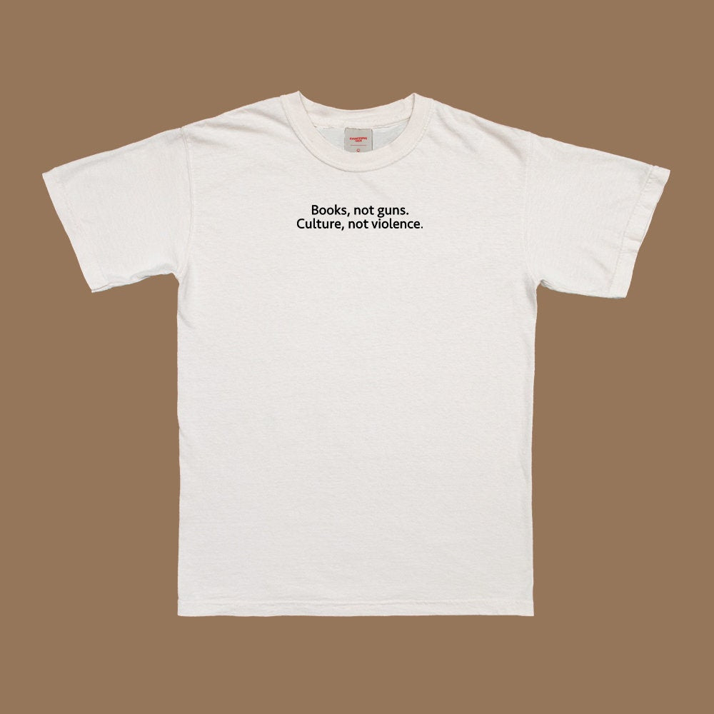 Books Not Guns Culture Not Violence T-Shirt