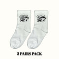 Light gray crew socks with 'Used be Cool' star cartoon print, pair
