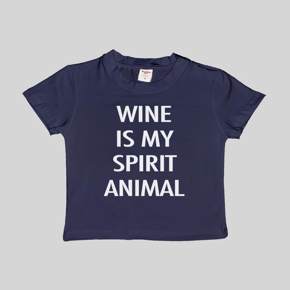 Navy cropped baby T-shirt with “WINE IS MY SPIRIT ANIMAL” in white letters.