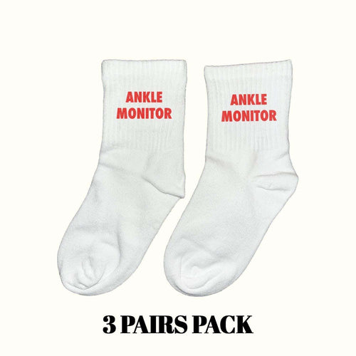 Ankle monitor socks, white crew with red 'ANKLE MONITOR' text