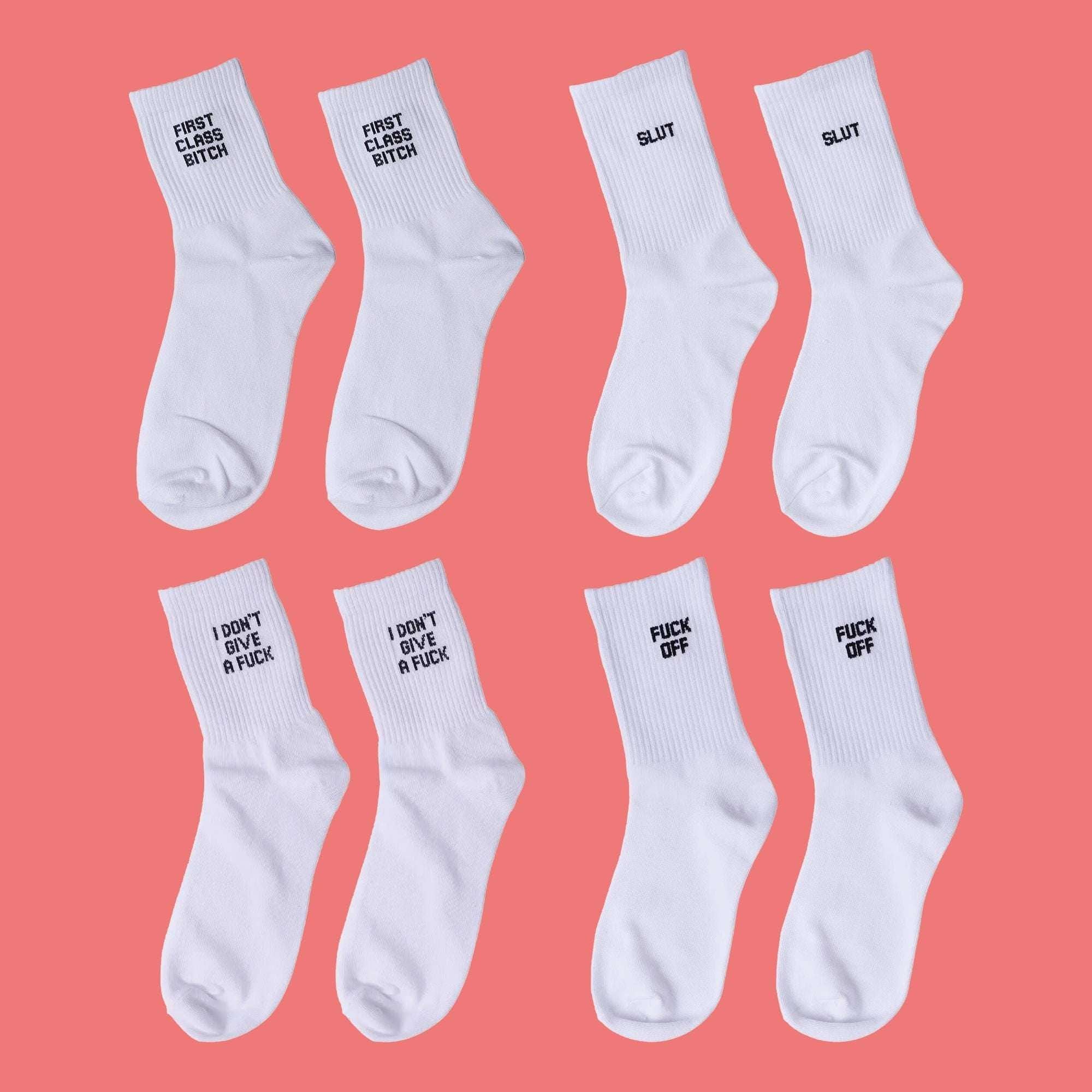 White crew socks set with cuff prints: FIRST CLASS BITCH, SLUT, I DON'T GIVE A FUCK